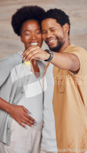 Image of Real estate, property and black couple with keys to a house during a pregnancy. Showing, mortgage and happy African man and woman in a family home while pregnant for housing, homeowner and relocation