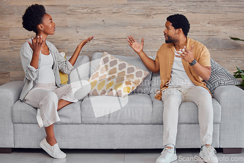 Image of Black couple, fight and angry on sofa for marriage problems, conflict and communication crisis. Divorce, argument and frustrated partner of man, woman and people in anger, affair or breakup in lounge