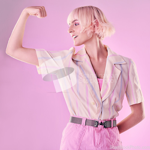 Image of Woman, flexing arm muscle and smile, power and strong female and winner isolated on pink background. Freedom fight, empowerment and strength with confidence, pride in challenge with champion and win