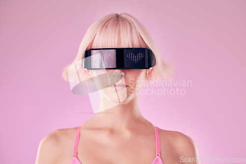 Image of Metaverse, virtual reality and a woman with glasses for ai and future scifi and 3d gaming technology. Model person on a pink background for cyberpunk and digital transformation for cyber world vr ux