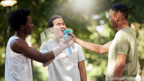 Image of Fitness, water bottle and friends toast in nature after workout, exercise or training. Sports, comic and group of happy men cheers with liquid to celebrate goals, targets and laughing at funny joke.