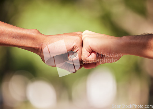 Image of Fist bump, hands and teamwork, support or collaboration for team building, solidarity or unity. Hand connection, partnership or greeting, thank you or motivation for success, goal or targets outdoors