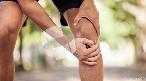 Image of Knee pain, hands and legs injury at park after training, workout or exercise accident. Sports, fitness and man or runner with fibromyalgia, inflammation or arthritis after .exercising, running or jog