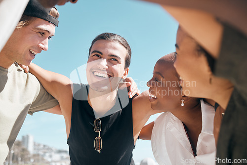 Image of Friends, huddle or diversity in solidarity, community support or bonding by travel beach in group social gathering. Smile, happy men or women in circle, summer holiday vacation or trust support group