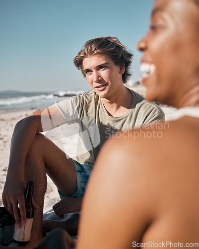 Image of Man, black woman or people bonding on beach sand and beer, alcohol drink or cider in holiday, vacation or summer travel. Smile, happy or picnic friends by ocean in community support or relax freedom