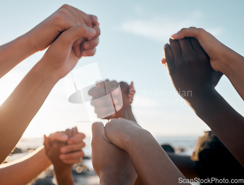 Image of Friends, bonding and holding hands on beach community trust support, social gathering or summer holiday success. Men, women and diversity people in solidarity, team building or travel mission goals
