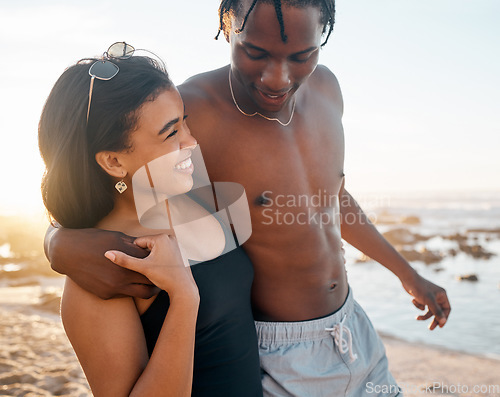 Image of Couple, happy or swimsuit hug on sunset beach in relax romance holiday, love vacation date or bonding summer location. Smile, black woman or man in swimwear embrace, freedom trust or travel support