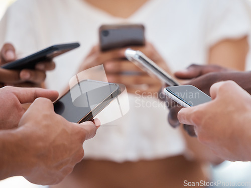 Image of Hands, phone and people networking on social media, mobile app or chatting on mockup screen. Hand of group holding smartphone in circle for online network share, data sync or communication on display