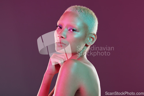 Image of Cyberpunk, beauty and portrait of woman with neon makeup and lights in creative advertising on studio background. skincare, art girl and model isolated for futuristic skin care mockup space.