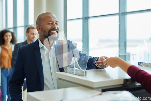 Image of Ticket check, counter and black man in airport line for passport or travel service. Happy customer person at security or consultant booth or glass window for business booking or buy paper at seller