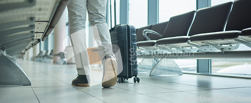 Image of Airport, suitcase and person legs walking to flight for international opportunity or global journey in lobby. Luggage of entrepreneur or business man feet with vacation, travel agency or hospitality