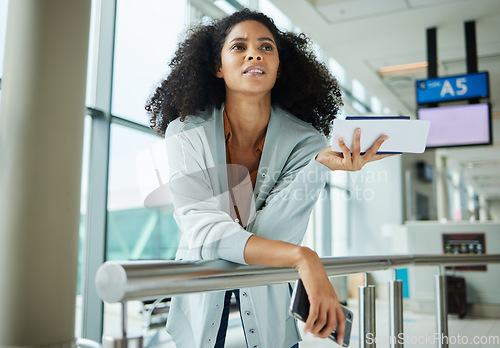 Image of Black woman, ticket and confused at airport waiting for travel, departure or business trip. African American female traveler holding document, boarding pass or phone in missed airline or flight delay