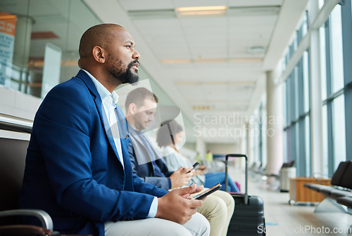 Image of Black man, phone and airport in waiting room by window for travel, departure or business trip journey. African American male in wait or flight delay at station for traveling, immigration or airplane