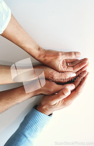 Image of Hands together, business people and solidarity of company group with work community and connection. Teamwork, support and trust of office team with white background showing collaboration goals