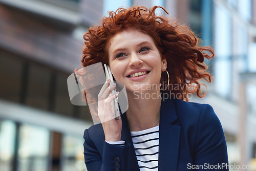 Image of Phone call, smile and ginger business woman outdoor with happy communication and discussion. Conversation, networking and work planning talk of an entrepreneur speaking with professional young person