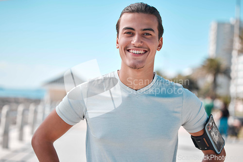 Image of Fitness, exercise and portrait of man with smile ready to start workout, training and cardio warm up. Sports, motivation mindset and male athlete in Miami for wellness, healthy lifestyle and running