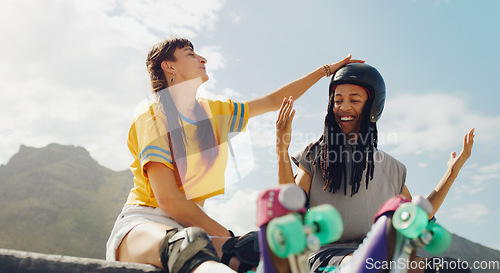 Image of Fun, playful and interracial couple rollerskating at a park, helping with helmet and gear in Brazil. Happy, laughing and man and woman getting ready to skate while bonding, talking and active