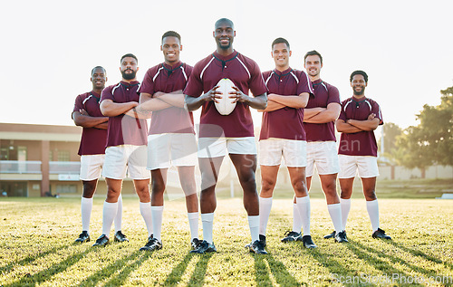 Image of Rugby, grass and portrait of team with smile standing together in confidence and solidarity for winning game. Diversity, black man and group of strong sports men with leadership, fitness and teamwork