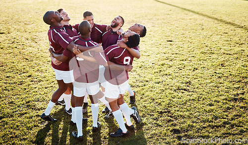 Image of Fitness, field and group in a huddle with motivation, strategy and coordination after training. Sports, collaboration and team of male athletes in unity before a game or match by a grass stadium.