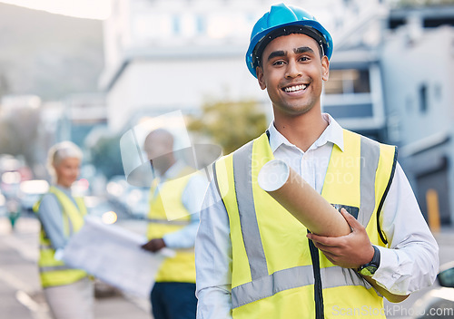 Image of Construction, architect and blueprint with man in portrait, smile and project plan at job site, contractor and happy leader. Mockup space, helmet for safety and architecture in building industry