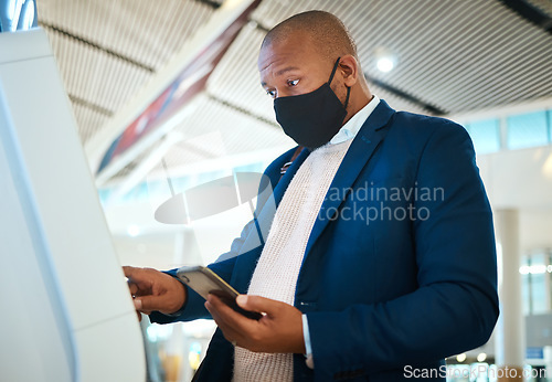 Image of Covid, travel and self service with black man and phone in airport for online booking, ticket and technology. Vacation, business trip and kiosk with passenger typing for flight, airline and check in