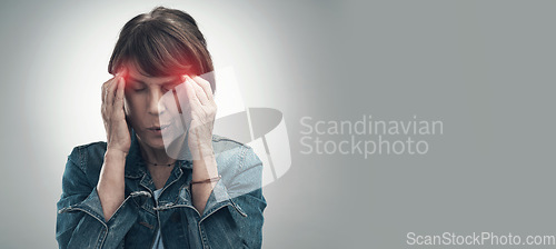 Image of Headache, pain and hurt woman with a migraine in due to depression, frustrated and anxiety in mockup space. Red, overlay and discomfort by a female feeling sick isolated in a studio gray background