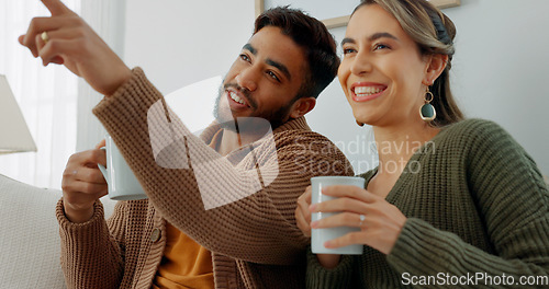 Image of Movie, coffee and couple watching tv or streaming an online series via a subscription for fun entertainment at home. Relaxing, smile and happy woman enjoying a film together on a sofa with partner