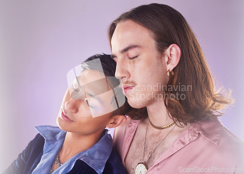 Image of Cyberpunk, tired and gay couple sleeping in makeup isolated on a pink background in studio. Futuristic, lgbt freedom and men friends napping for fatigue, love and together on a bokeh backdrop