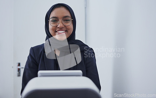 Image of Optometry, smile and portrait of a Muslim woman with a machine for a vision test and eye care check. Ophthalmology, service and Islamic optician smiling with equipment for a lens checkup at clinic