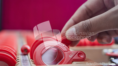 Image of Optometry, hands and trial lenses for a eye test for vision, eyecare and healthcare in a optic clinic. Eyewear, glasses and optician or ophthalmologist choosing a prescription lens in a optical store