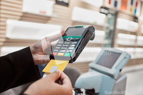 Image of Hands, credit card and machine for banking transaction, ecommerce or payment at clinical store. Hand of customer making purchase or debit insert for electronic pay, bank or buying at optometry shop