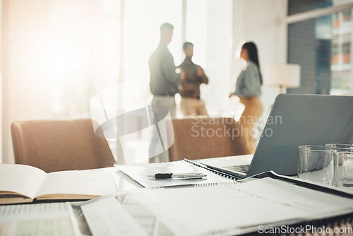 Image of Desk, paperwork and notebook with laptop in office, professional workspace and setup, folder and planning. Strategy, documents and research, busy with business proposal with meeting and information