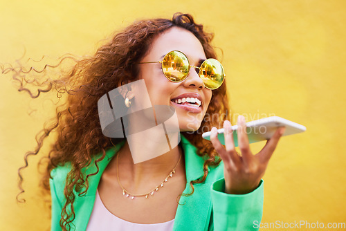 Image of Audio message, laughing and woman on a phone call for communication, connection and chat. Voice assistant, record and girl speaking through a mobile for discussion and talking on a city wall