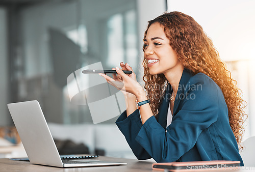 Image of Businesswoman, laptop and phone for voice note in schedule planning, strategy or speaking at office desk. Happy female manager talking on smartphone speaker by computer for project plan at workplace