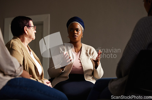 Image of Support, black woman and senior group therapy with understanding, feelings and talking in session. Mental health, grief or depression, people in retirement with therapist sitting together for healing