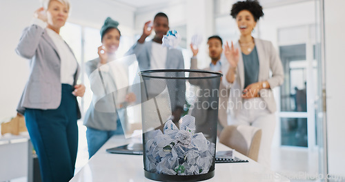 Image of Office, trash and business people throw paper as a competition, game or challenge together. Happy, diversity and excited corporate team playing with with supplies in a bin for fun in the workplace.