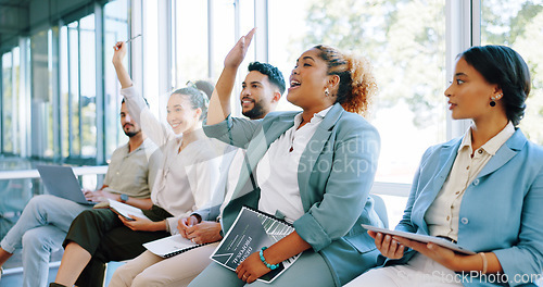Image of Interview, question and training with a business black woman raising her hand to answer during a meeting. Recruitment, human resources and hiring with a candidate group sitting in a row at an office