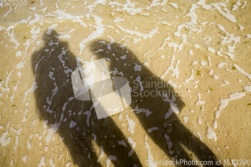 Image of shadows of two people