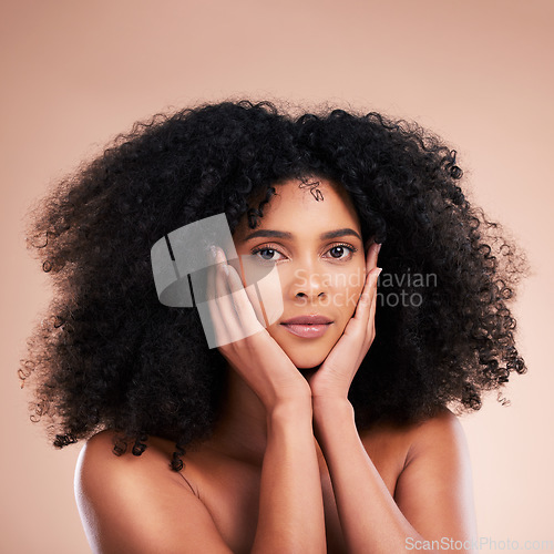 Image of Black woman, portrait or afro hair with hands on face in aesthetic empowerment, curly texture pride or skincare glow. Beauty model, natural or hairstyle ideas and makeup on isolated studio background