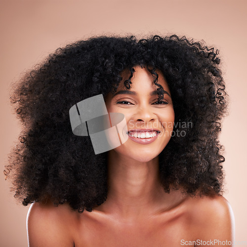 Image of Black woman, afro hair or portrait smile on studio background in empowerment pride, curly texture or skincare glow. Beauty model face, happy or natural hairstyle and makeup aesthetic on isolated wall