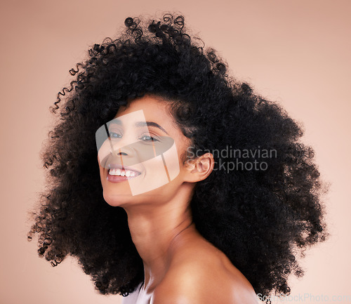 Image of Black woman, afro hair or skincare glow on studio background in empowerment pride, curly texture or healthy growth. Beauty model, happy or natural hairstyle and makeup aesthetic on isolated spa wall