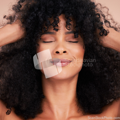 Image of Beauty, hair care and face of black woman in studio for makeup, cosmetics and skincare glow. Aesthetic model with natural curly afro for shampoo growth and shine or volume on a gradient background