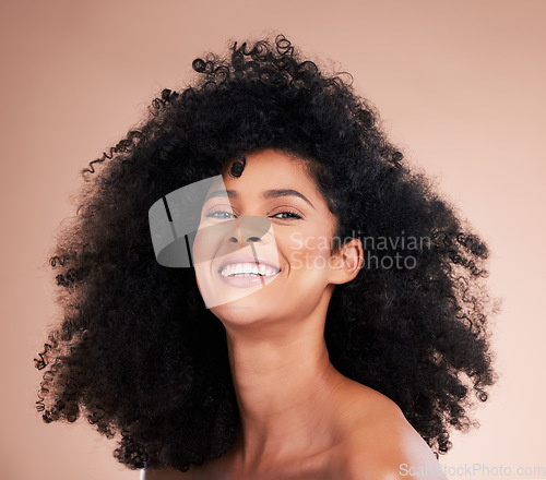 Image of Model, afro hair or beauty portrait on studio background for aesthetic empowerment, curly texture or skincare glow. Happy black woman, face or natural hairstyle and makeup cosmetics on isolated wall