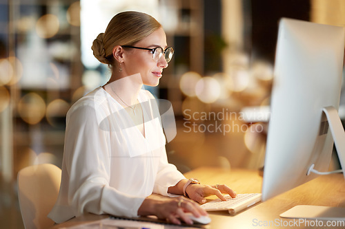 Image of Serious, research and woman on a computer for email, software development and programming. Web design, database and employee working on coding analytics and deadline as a programmer on a pc at work
