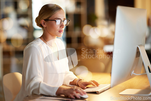 Image of Business, night and woman with computer, typing and data analysis for project, profit growth and focus. Female employee, leader and manager with pc, overtime and online reading for search website