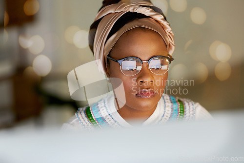 Image of Black woman, face and reading on computer screen, focus and working, editor and research with bokeh overlay. Female in office, review and data analysis with check article for blog or read email