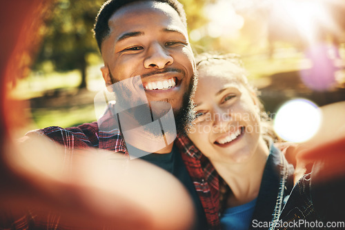 Image of Love selfie, couple and portrait smile at park outdoors, enjoying fun time and bonding together. Interracial, romance and face of black man and woman taking pictures for happy memory or social media.