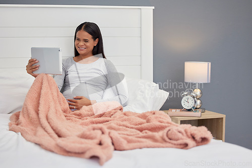 Image of Pregnant woman, video call and tablet for communication in home bedroom for online consultation. Person happy with internet connection for gynecology telehealth, pregnancy update and talking at night