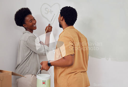 Image of Heart painting, love or black couple home renovation, diy or house remodel laughing together with paintbrush. Happy smile, woman and funny African man with partnership, team work or collaboration