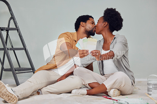 Image of Painting color, love or black couple kiss in home renovation, diy or house remodel together by apartment ladder. Design, choices or African man kissing pregnant woman excited about baby or new family